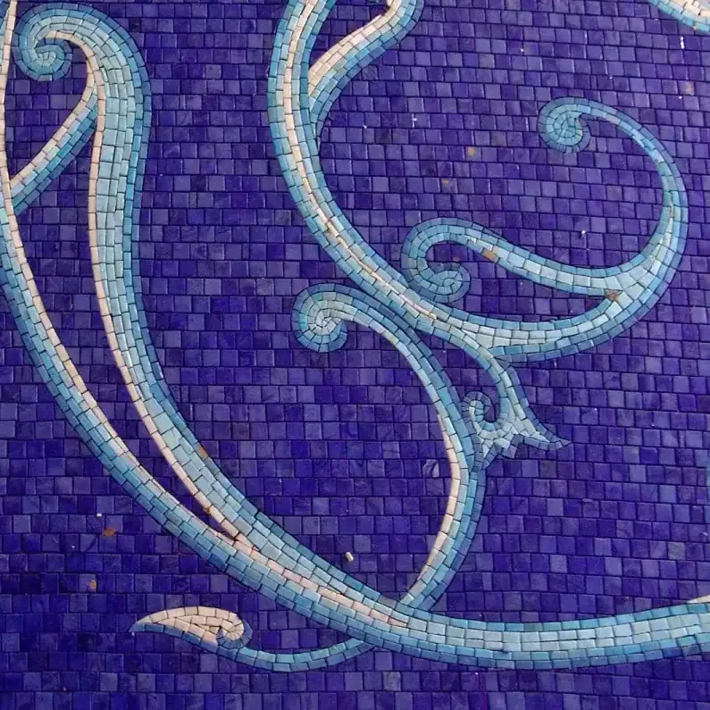 Mosaic glass pool design with intricate swirling patterns on Naples Bay.