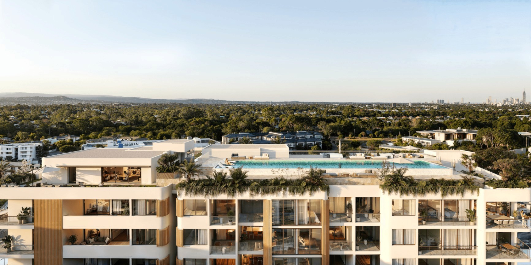 Rooftop pool and modern apartments at COMO Varsity Lakes with panoramic views across Gold Coast and surrounding suburbs