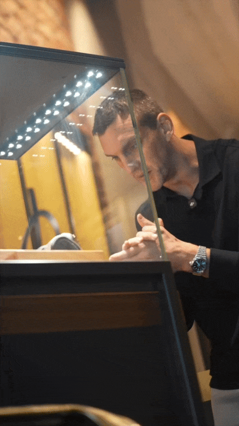 Bride in white dress walking on street, blurred motorcycle passing