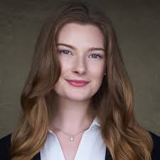 Young man in navy and white striped t-shirt with cap