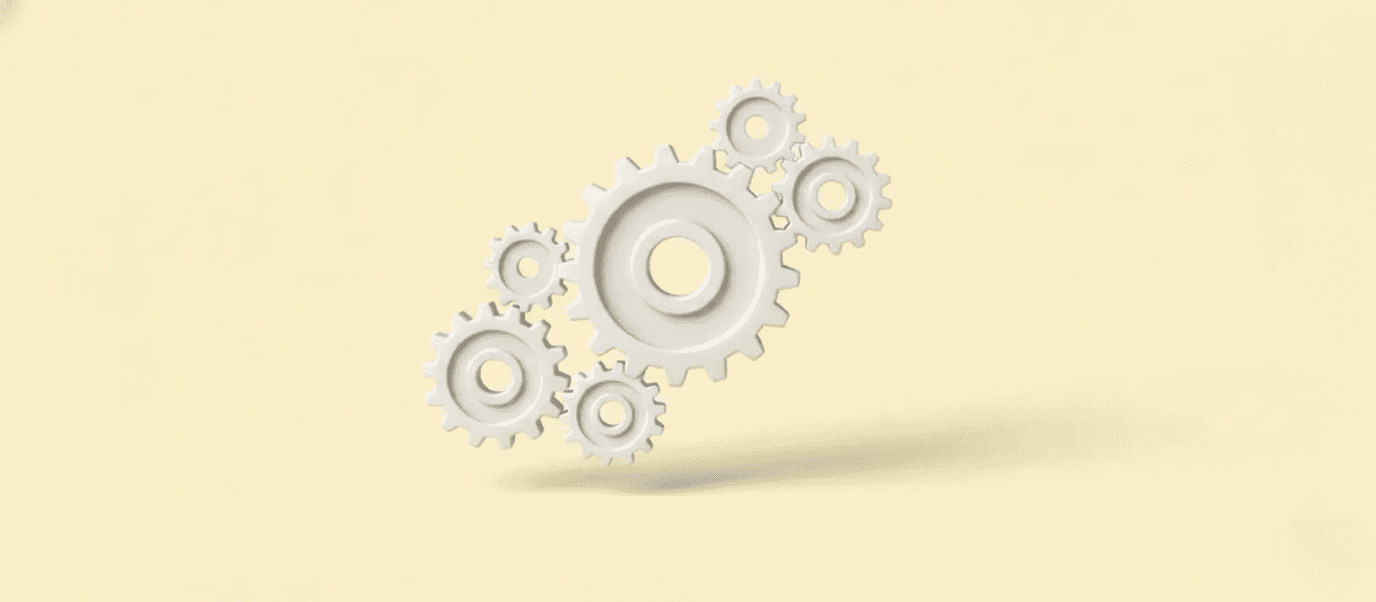 A 3D illustration of a claymorphic gear assembly against a yellow background