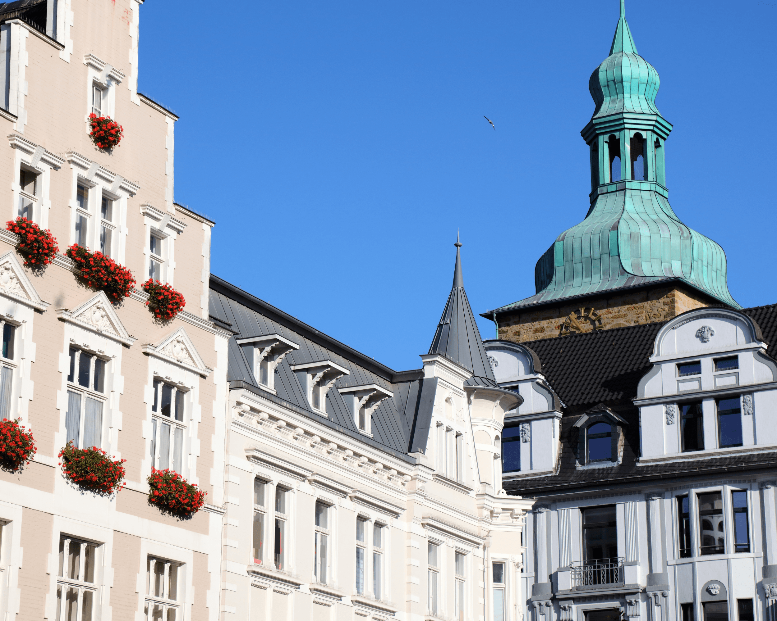 kids lying on a glass land and smiling