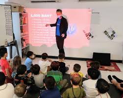 man in black crew neck t-shirt wearing black framed sunglasses