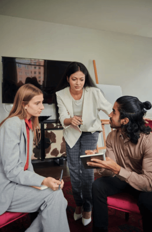 A cozy scene with warm sunlight casting stripes, featuring a potted plant and soft towels on a window sill.