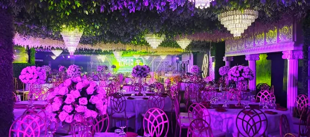 Corporate event reception in violet lighting at Pandora Hall, Stalla Suites QC