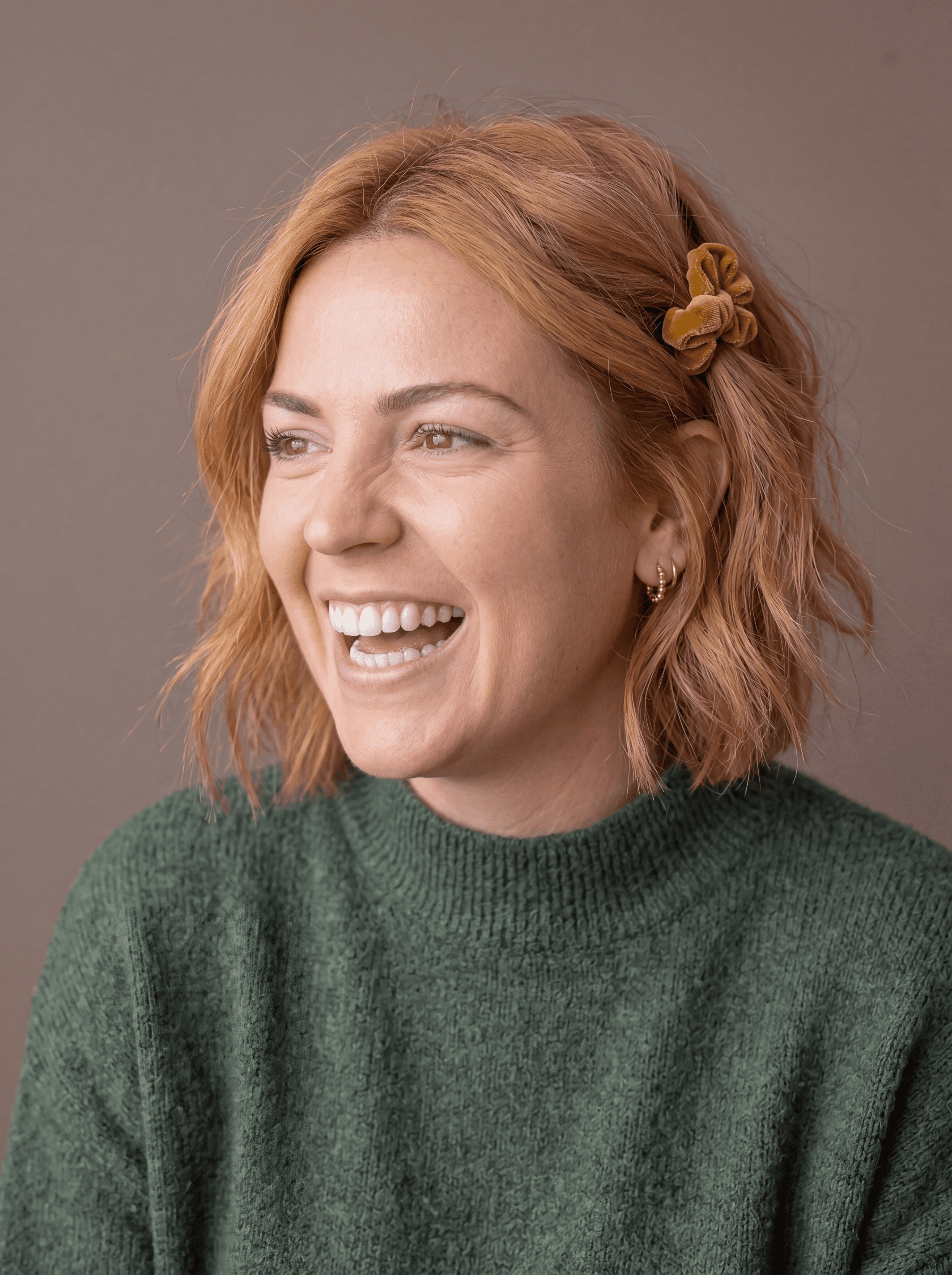 Woman sitting cross legged meditating in a mindfulness vibe