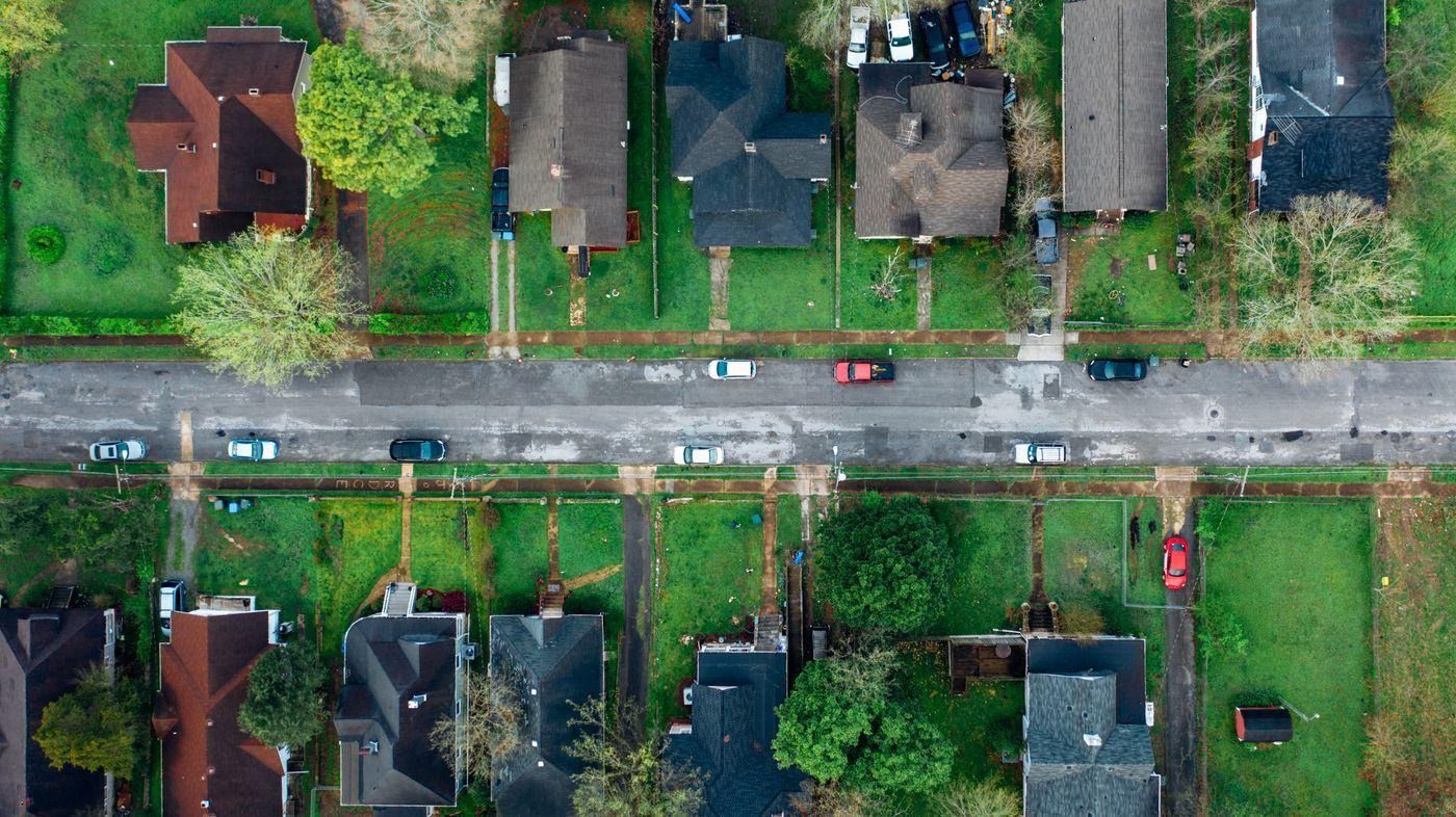 Aerial view of a residential neighbourhood — the kind of lots you need to vet before buying