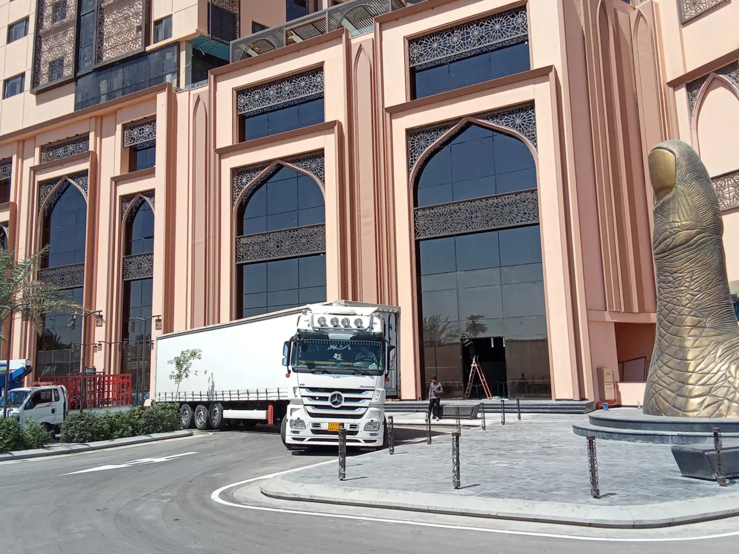 Drone view of a cargo truck on a highway.