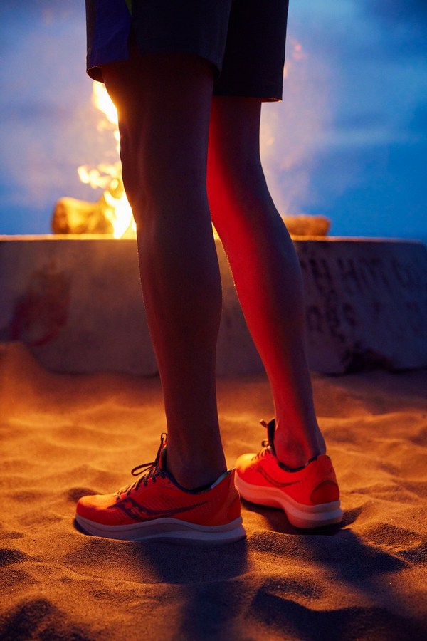 a person walking in a sunset evening