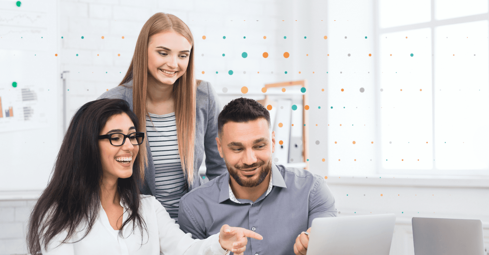 Lean Tree Junior professionals around laptop screen