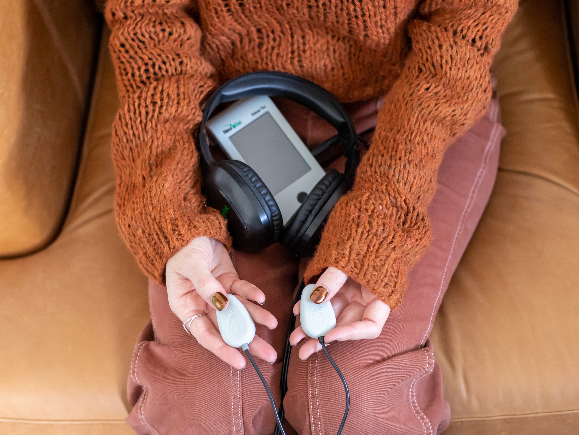 person holding baby's index finger