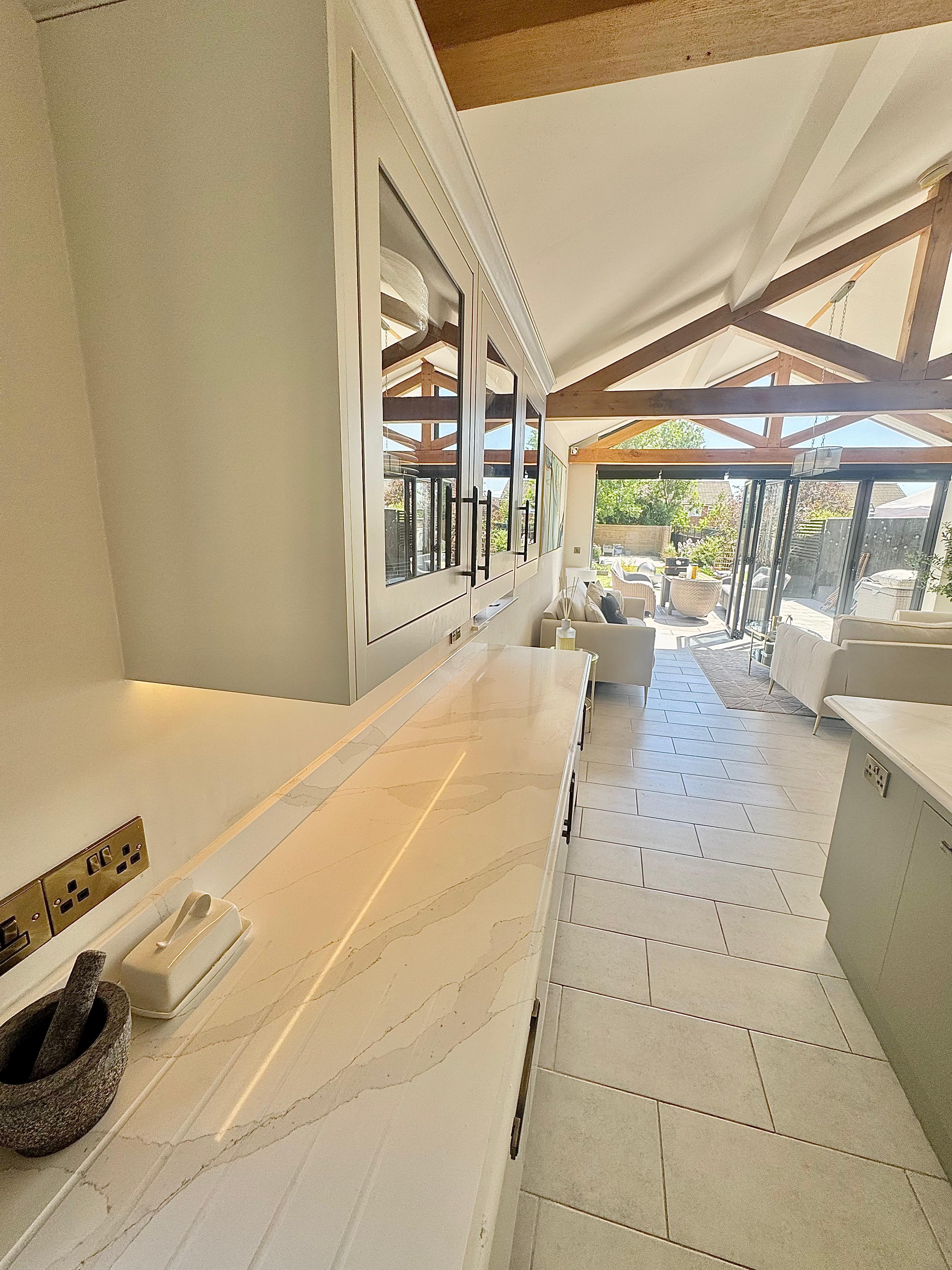 Grey shaker kitchen with range cooker