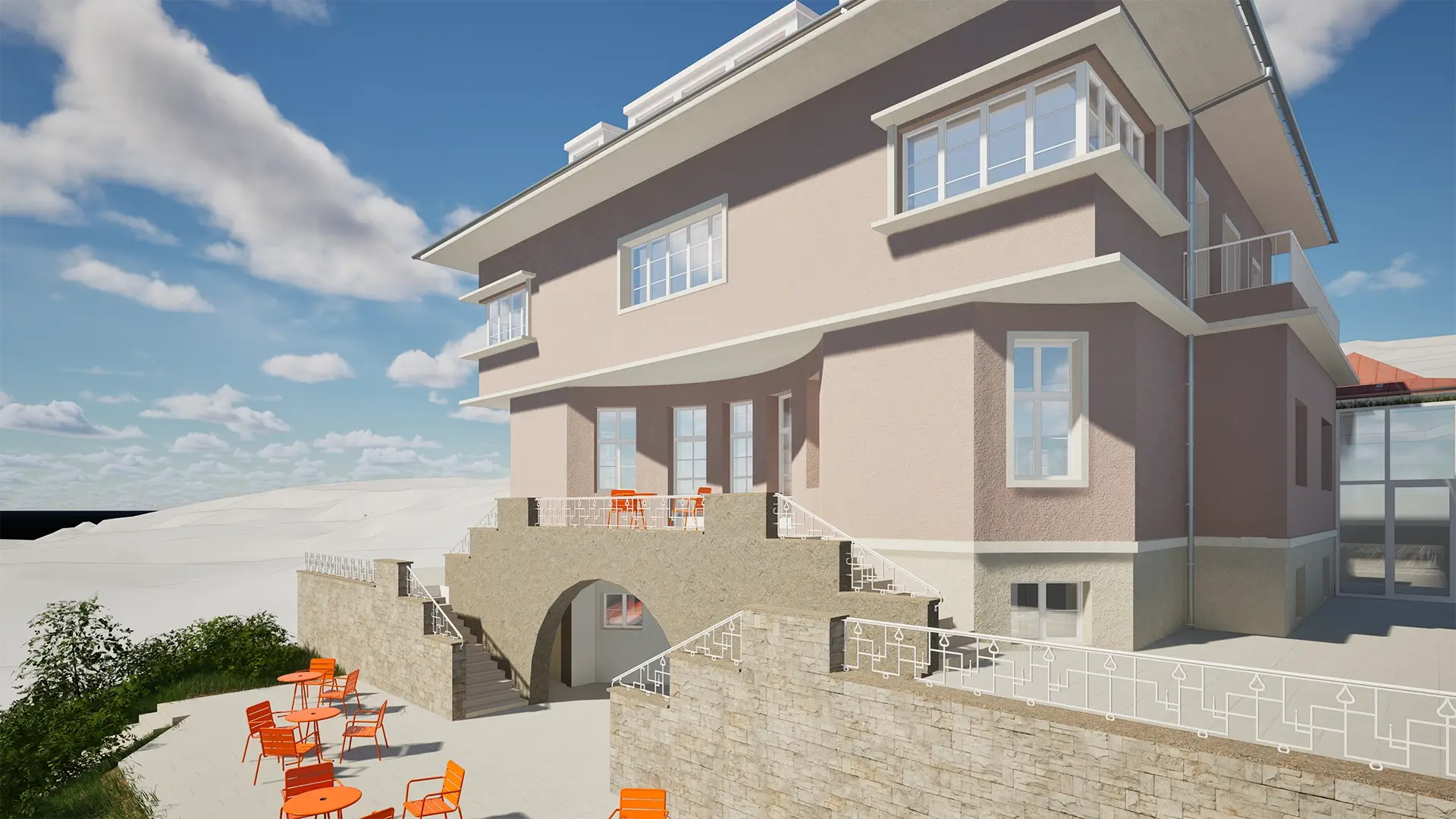 Světlý, otevřený prostor navržený jako budoucí místo pro setkávání a komunitní život.