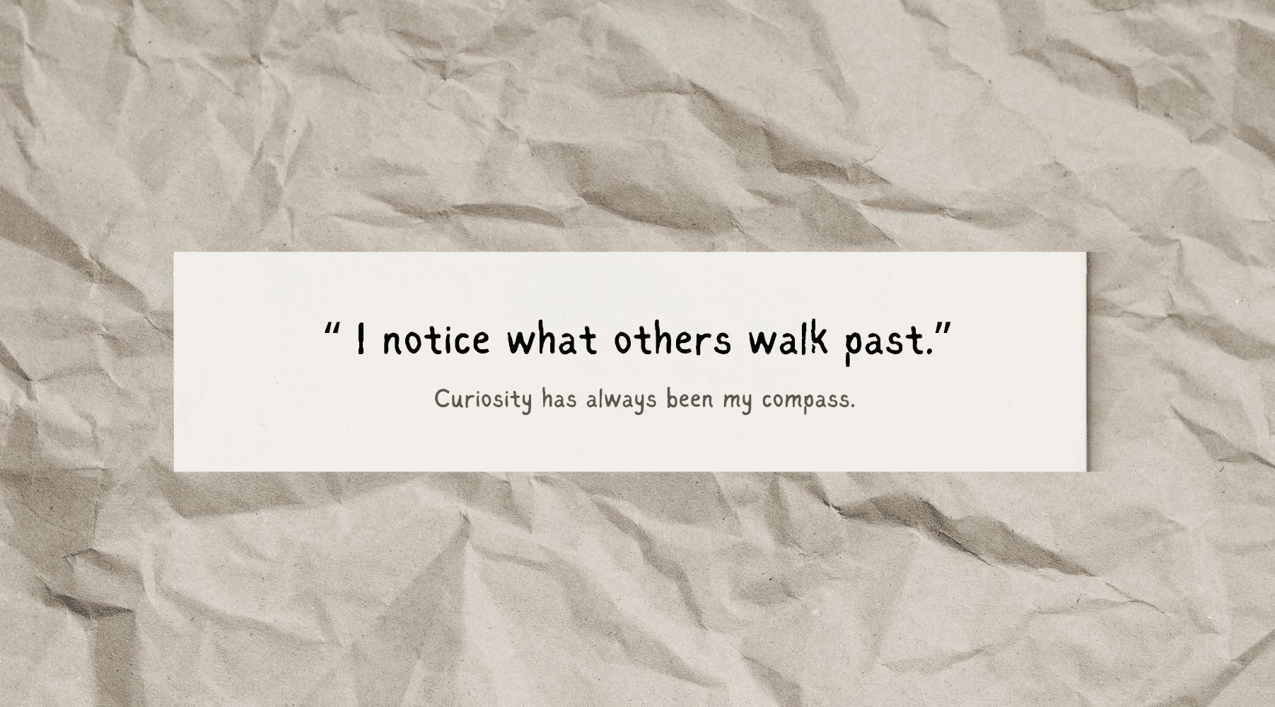 man filming on beach