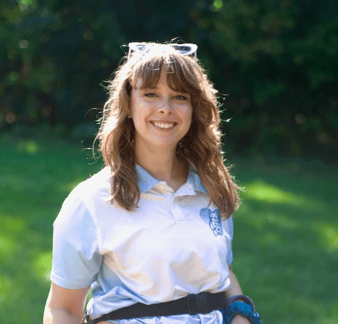 Megan professional dog walker with two dogs