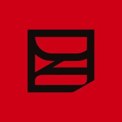 man standing near white wall