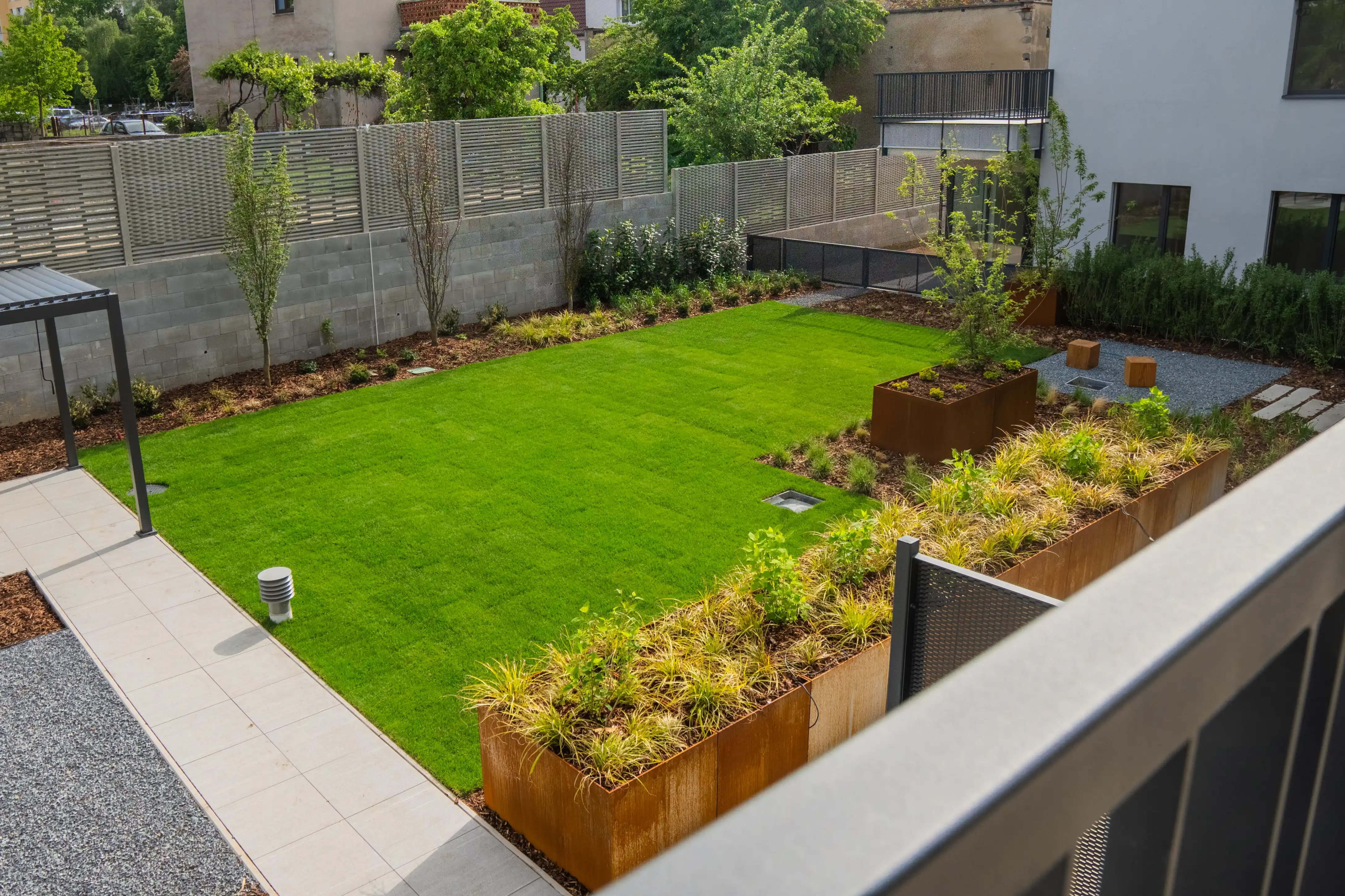 Beautiful landscaped garden with greenery and outdoor design elements.