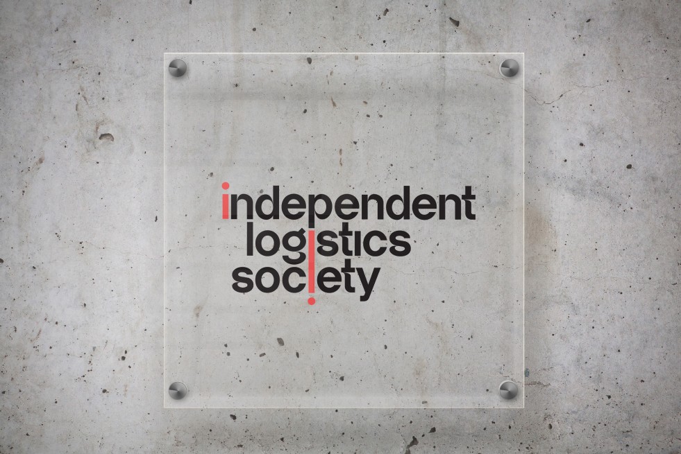 Logo on Acrylic panel mounted to concrete wall.