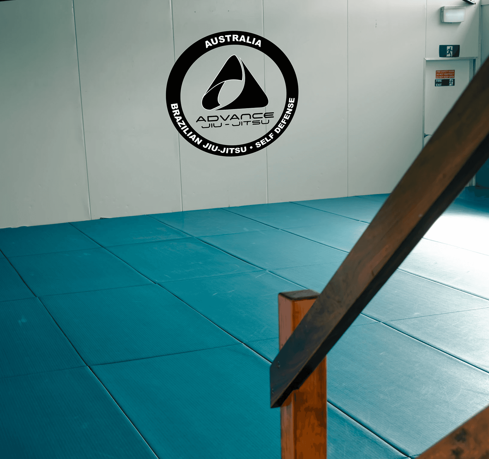 View of blue training mats inside the Gracie Sydney dojo