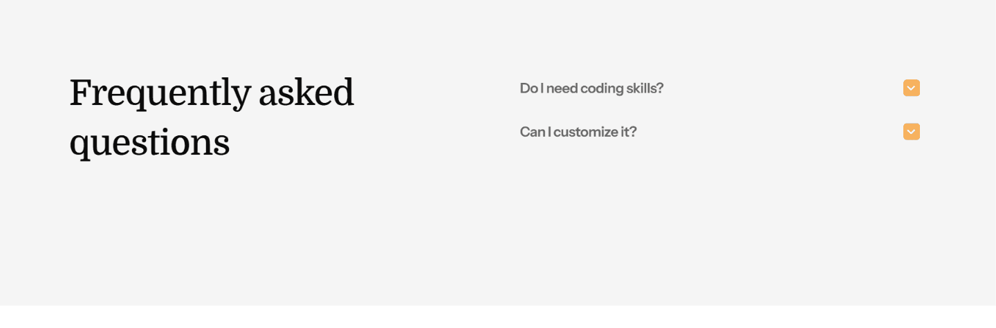 A MacBook with lines of code on its screen on a busy desk