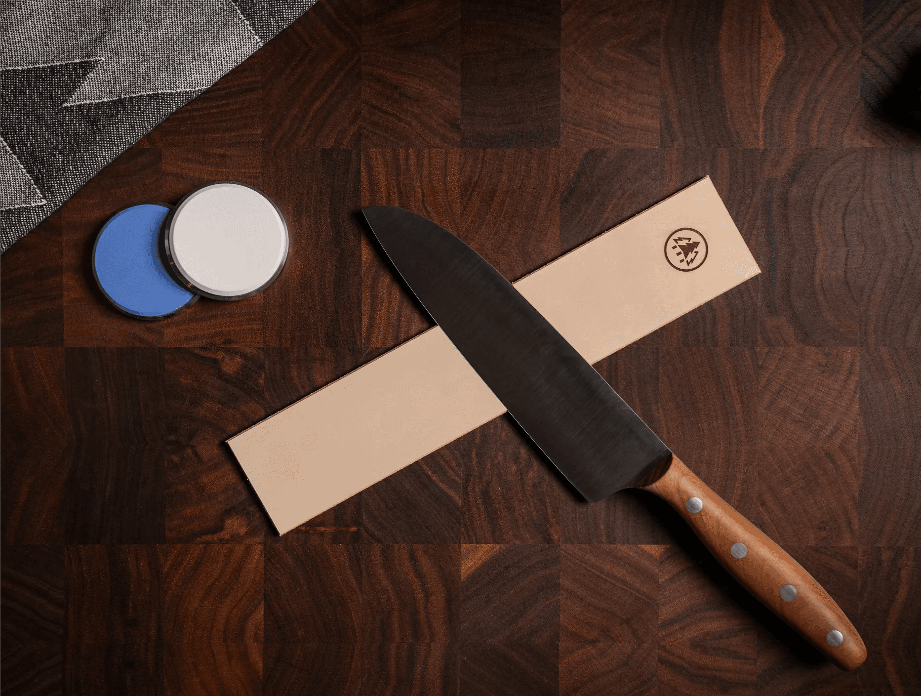 Placing the HORL® Leather Strop on a flat, stable surface in preparation for knife stropping.