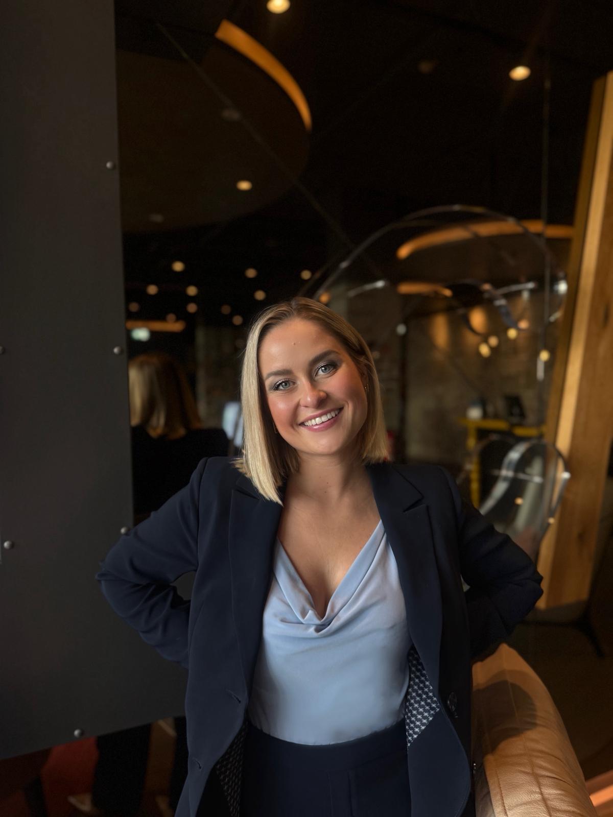 person sitting in a chair in front of a man