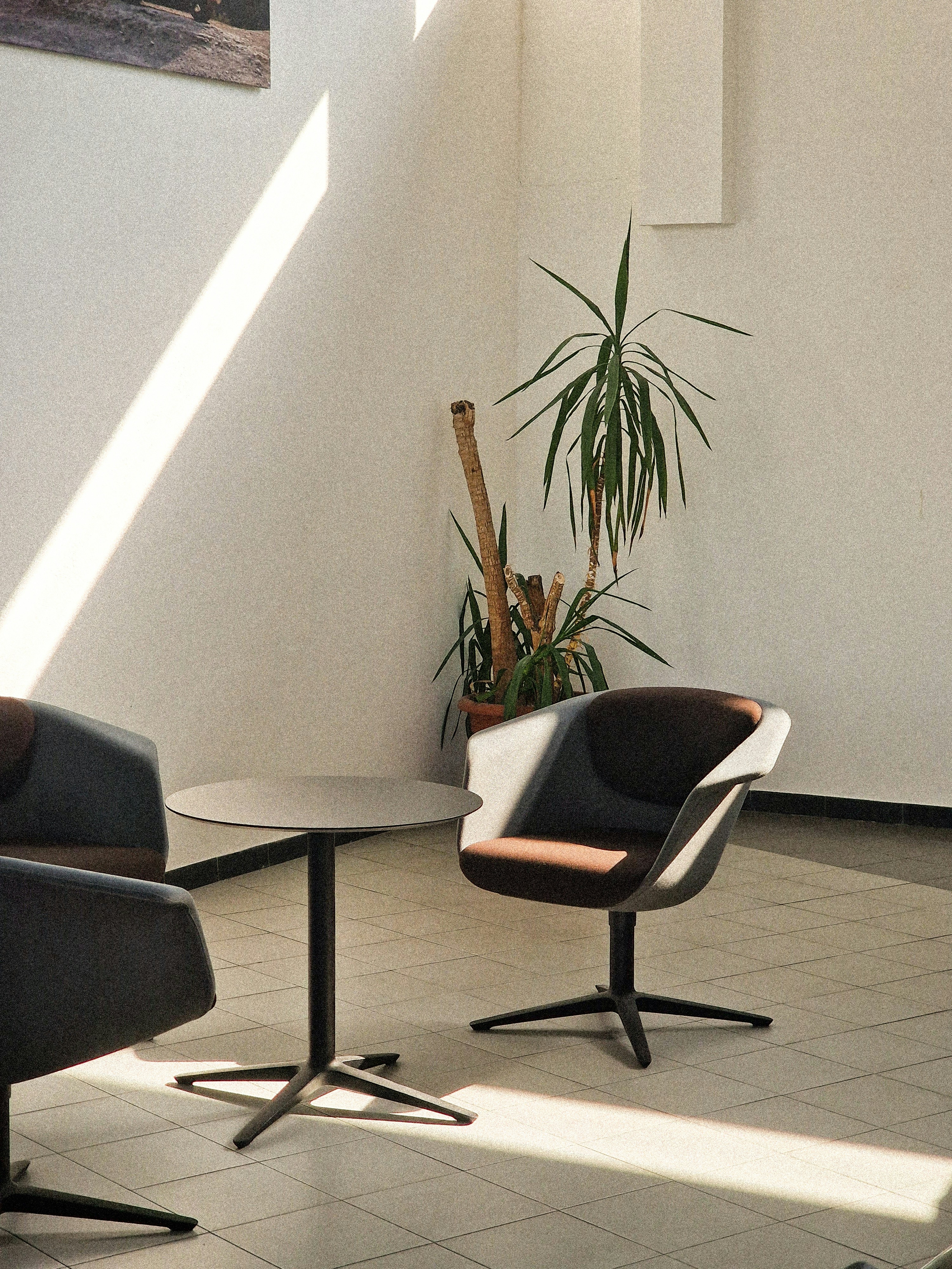 A room with two chairs and a table