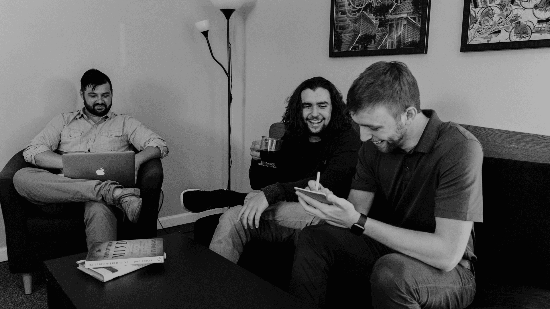 Three people sitting