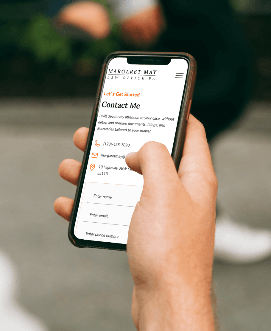Individual hold mobile phone with open site on it