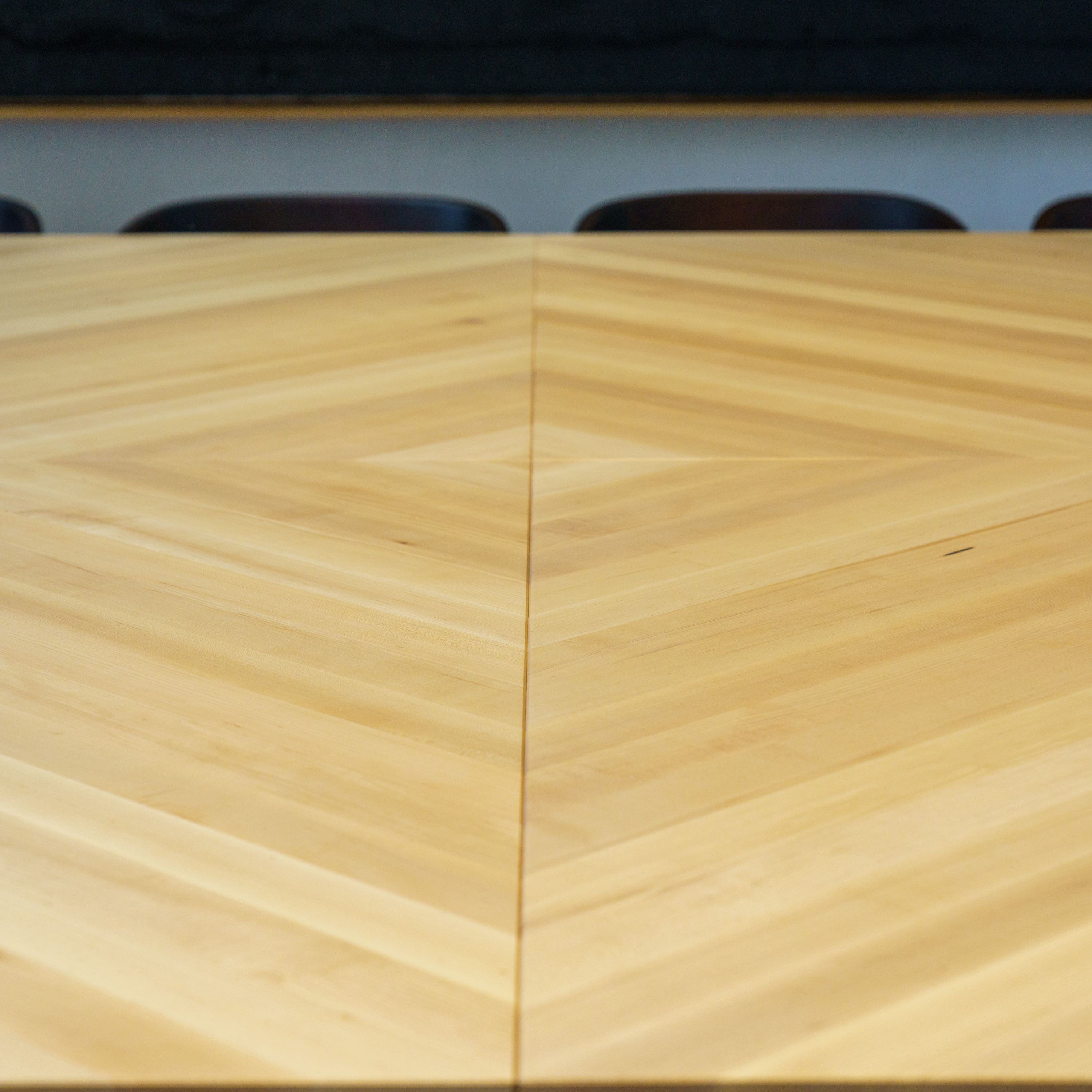 Each stick of timber was cut and laminated to match in a diamond formation