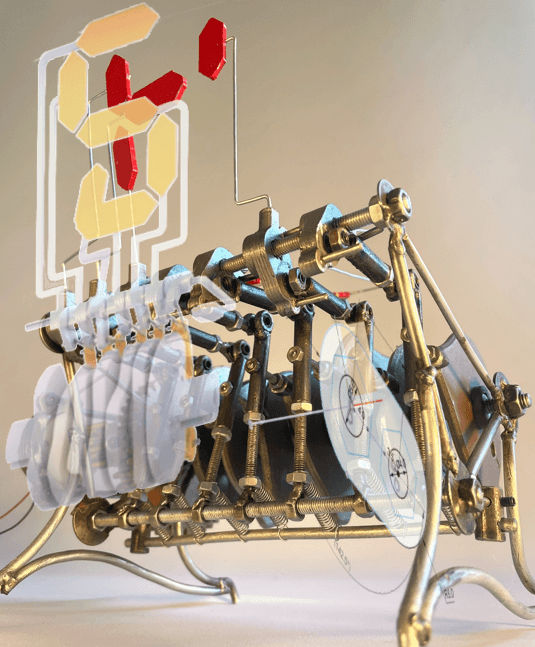 Machine rétro futuriste en métal et plastique transparent affichant les chiffres de 0 à 9 de manière mécanique comme un compte à rebours