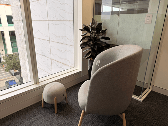 Reflective chair near window