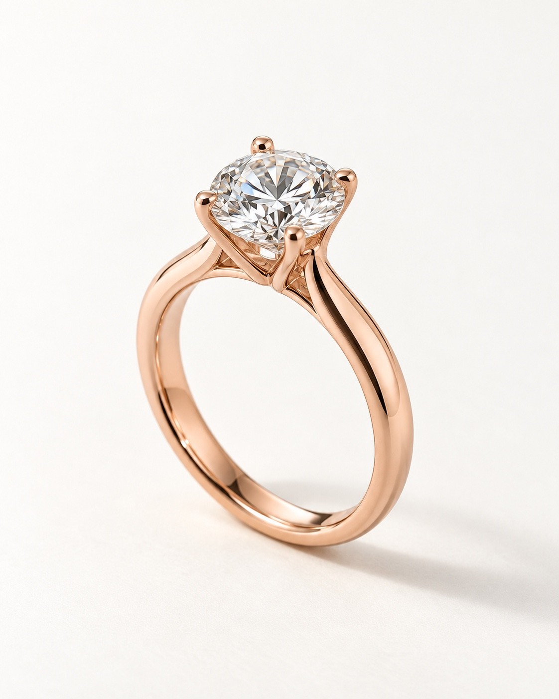 Rose gold solitaire ring with a round diamond