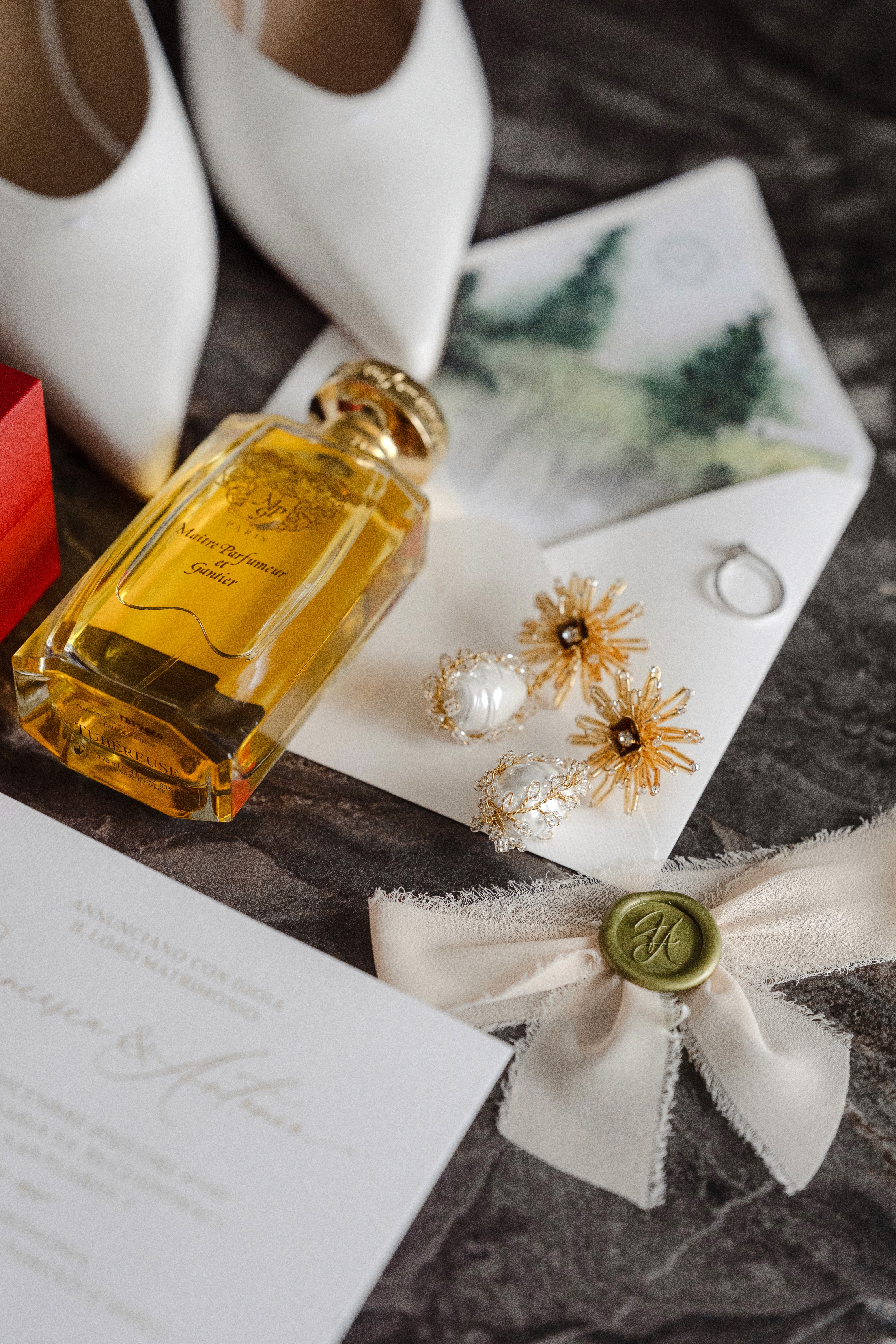 A couple stands closely in an intimate embrace.