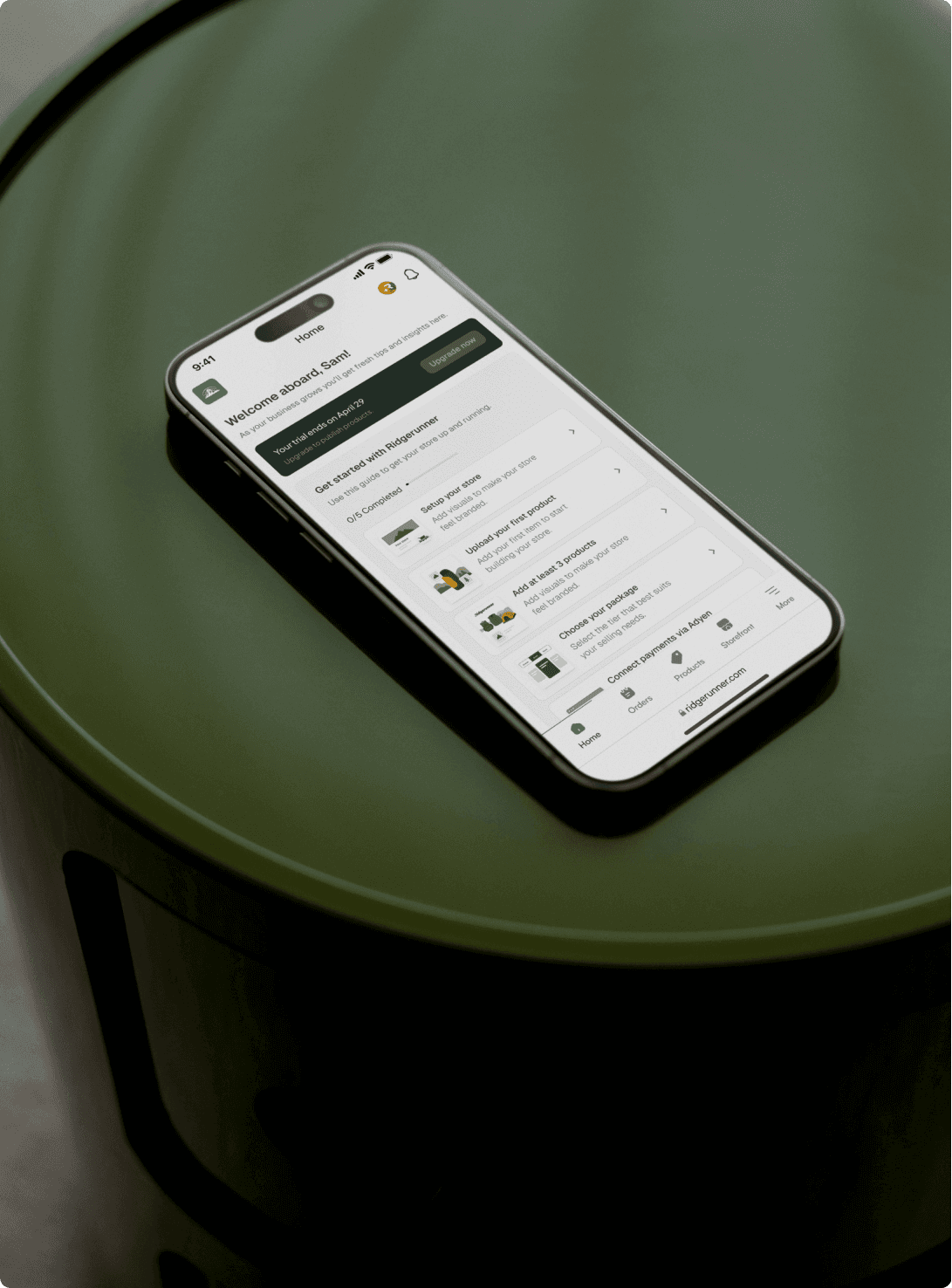 Modern iPhone sitting on a green table