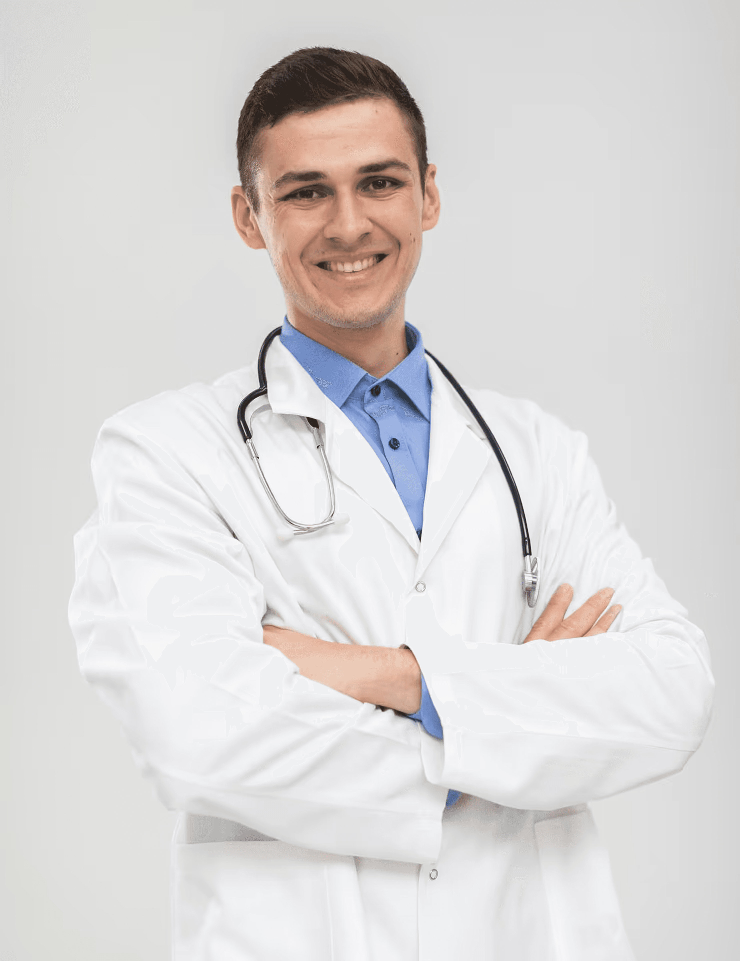 a man in a white shirt and tie posing for a picture