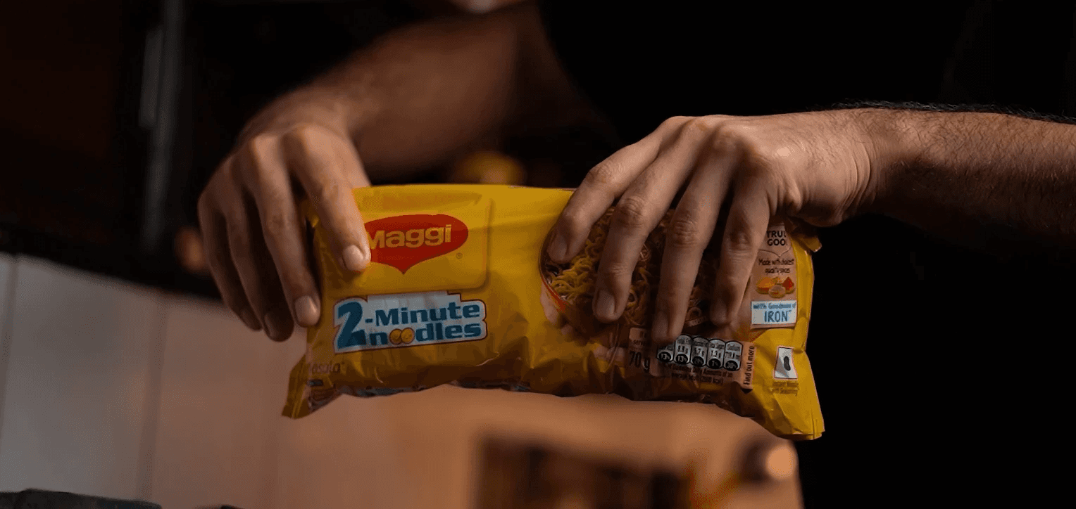 a woman holding a red flower