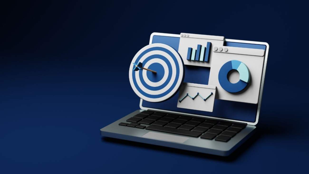 An open laptop with an arrow stricking the bullseye representing retargeting with a blue theme surounding it.