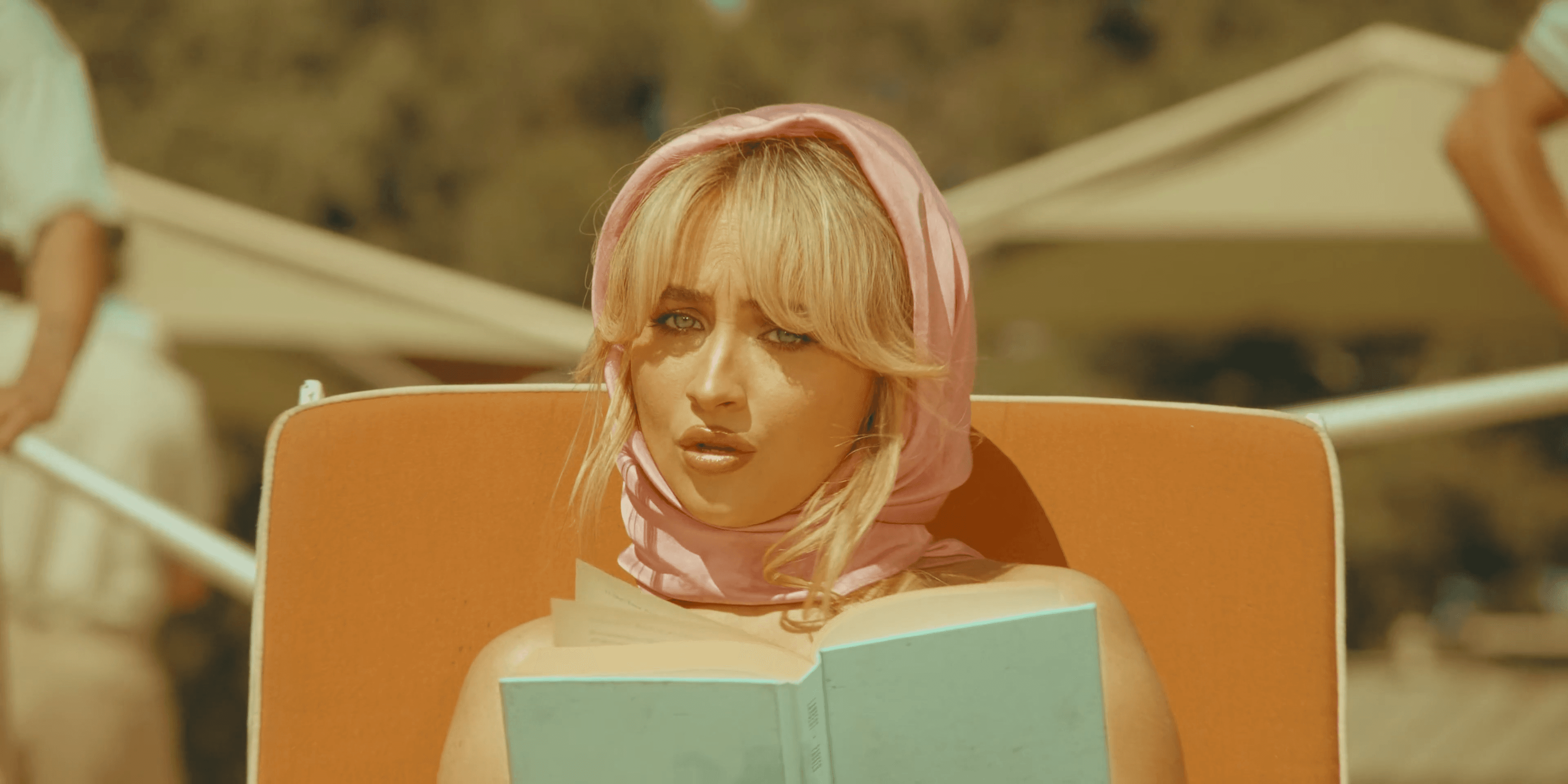 Two white houses nestled in a foggy, mountainous landscape.