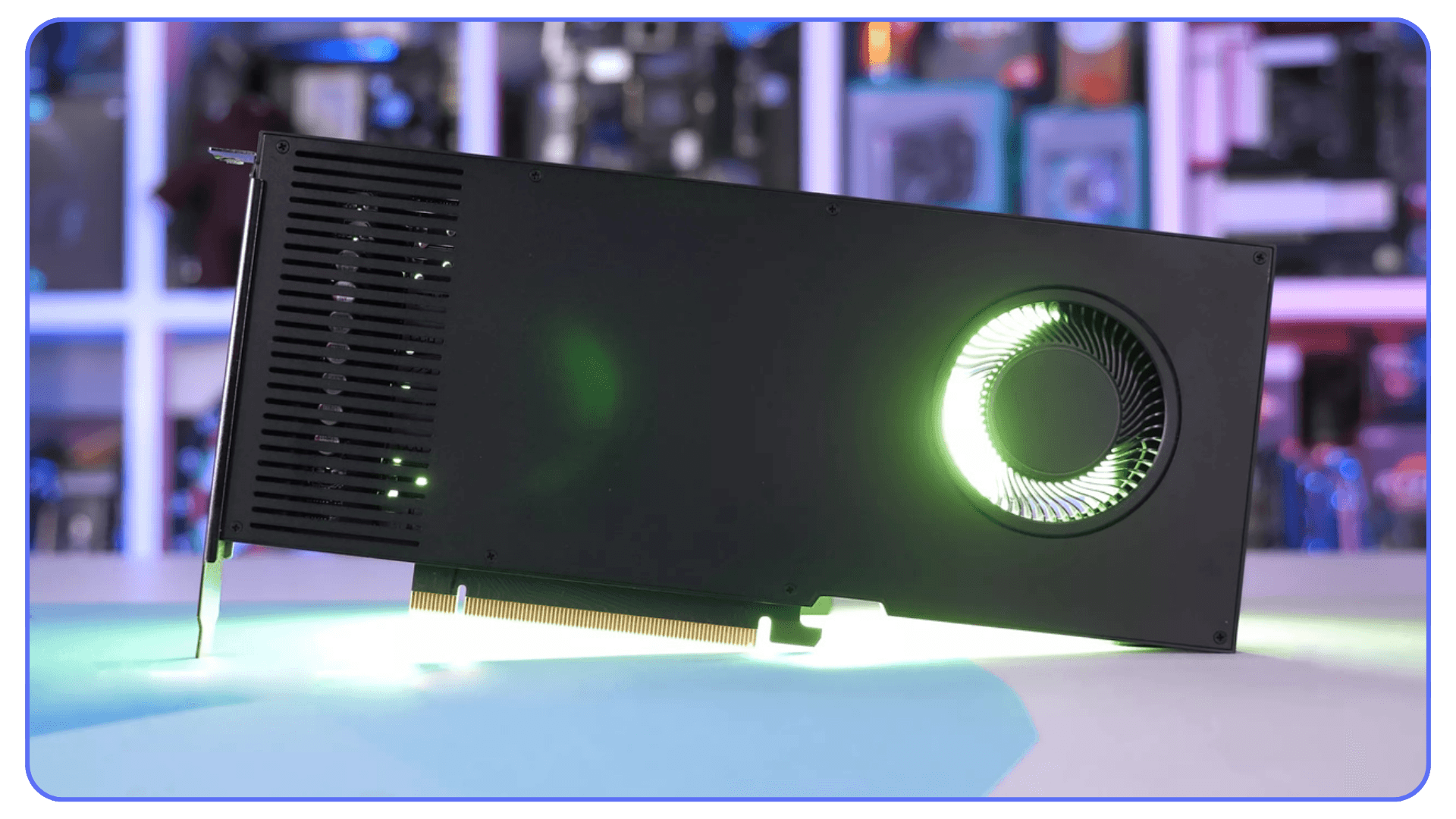 A professional workstation GPU with a blower-style cooling fan illuminated by green light.