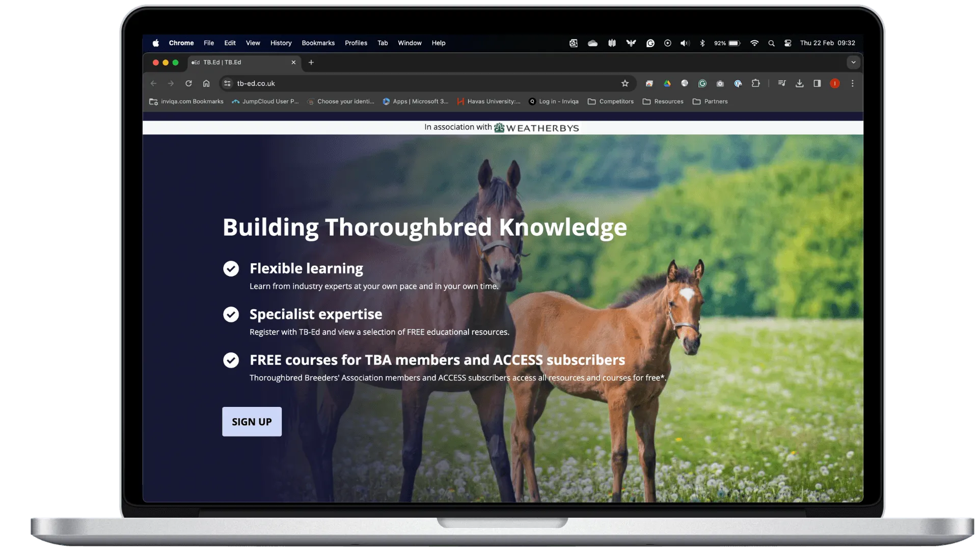 TBA website on laptop