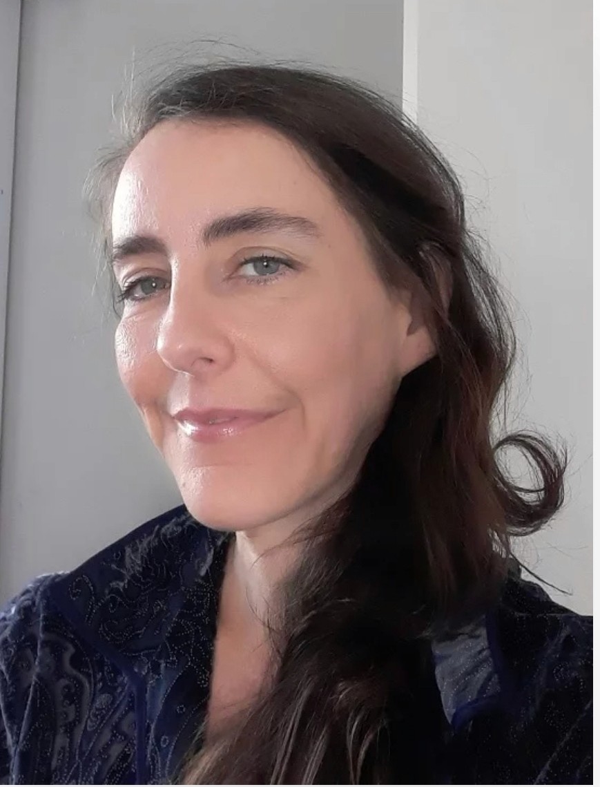 baby playing multicolored xylophone toy