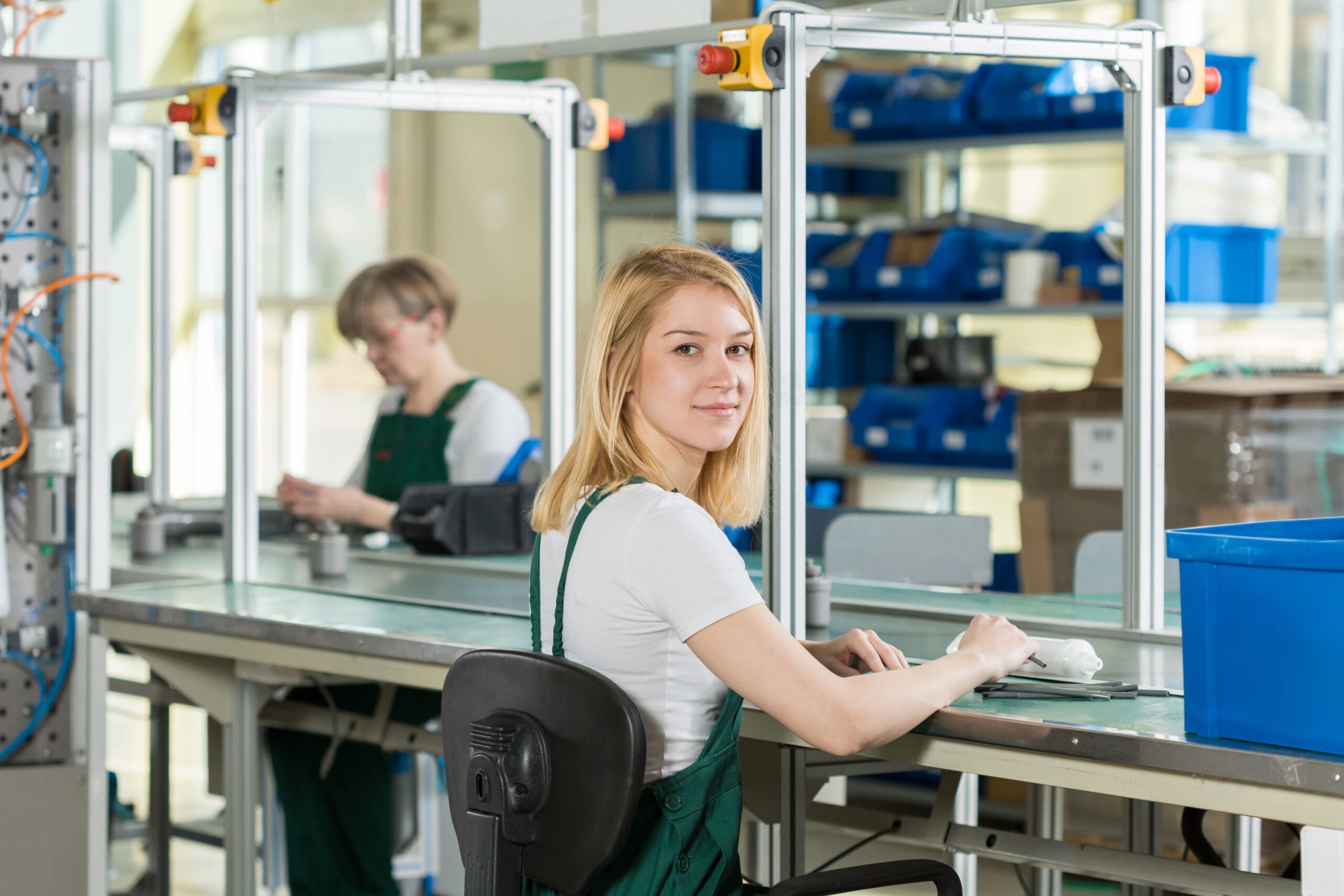 Young production line worker