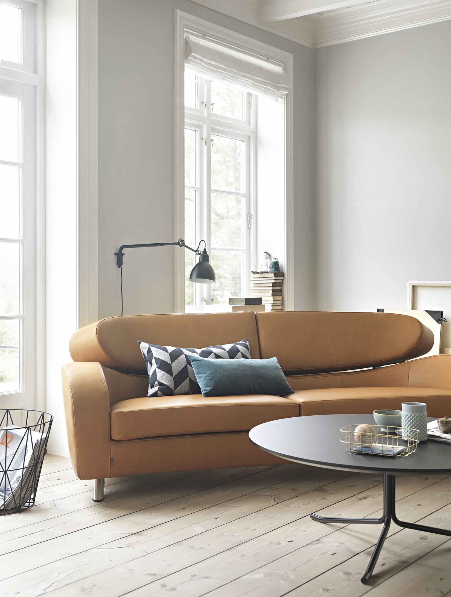 A scene of a ceramic plate with two pears on it