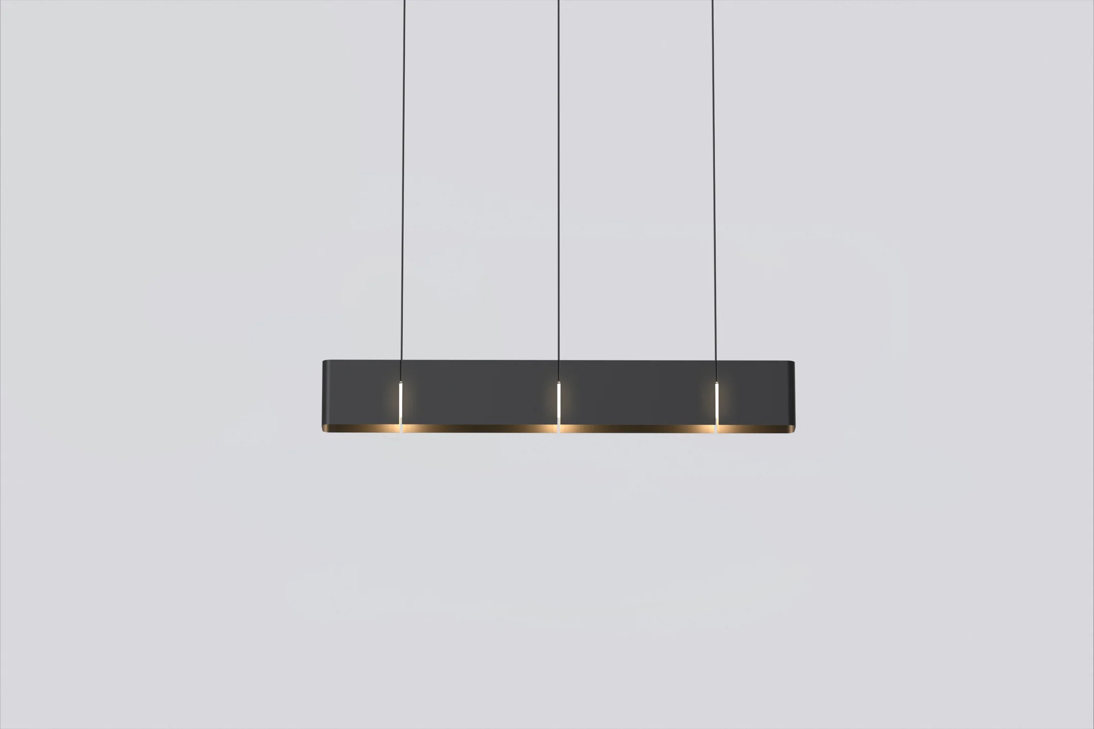 Oddthing Long Light in matte dark bronze, linear powder coated aluminium pendant with light escaping between panels