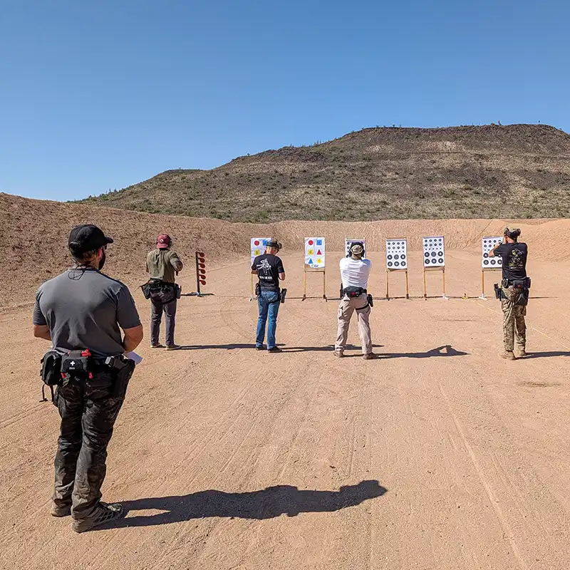 Tactical shooting course with live-fire training drills and professional instruction in outdoor range