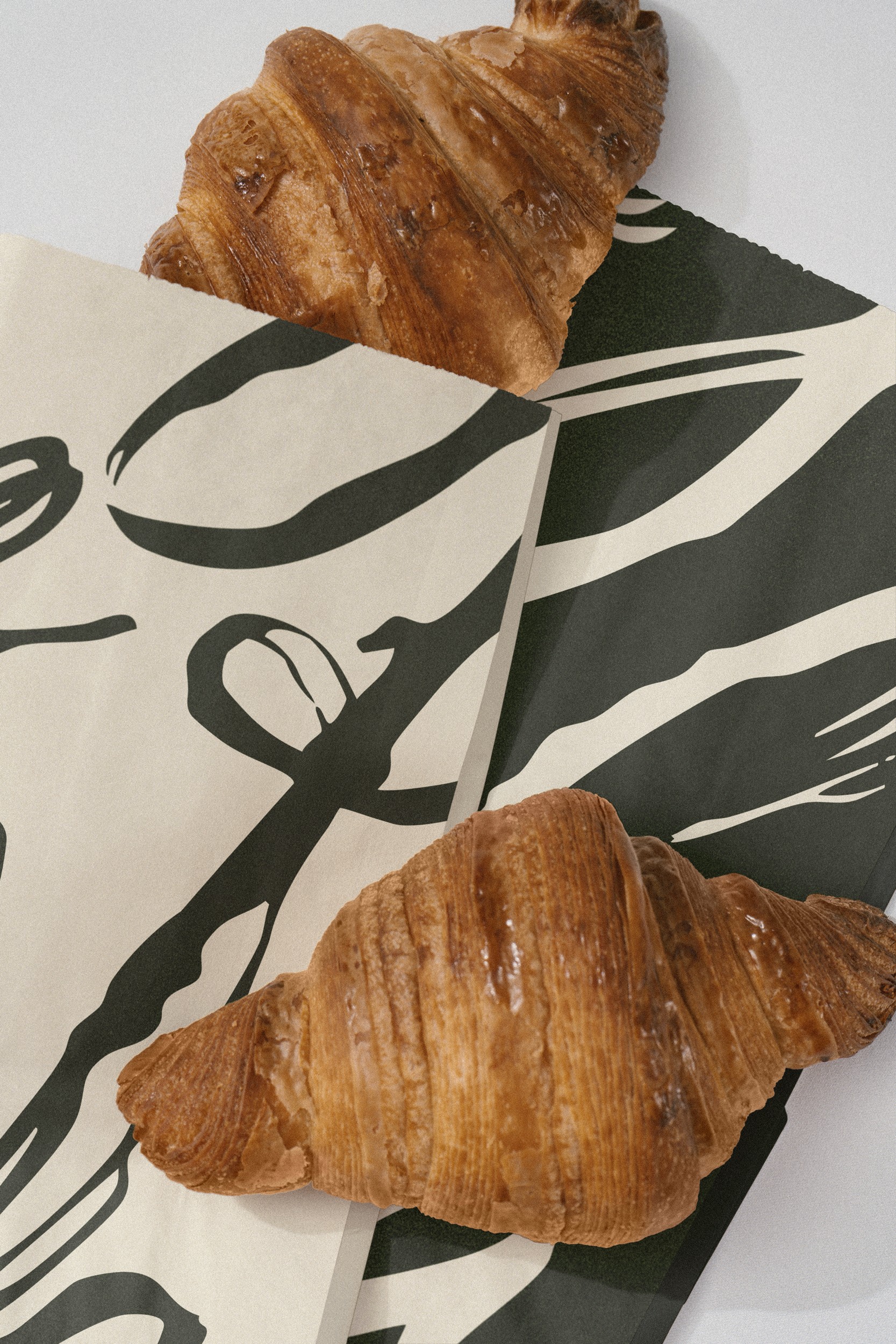 Mise en situation de l’univers graphique du restaurant Au fil du goût. Couleurs harmonieuses et composition visuelle qui reflètent l’identité contemporaine et soignée du restaurant.