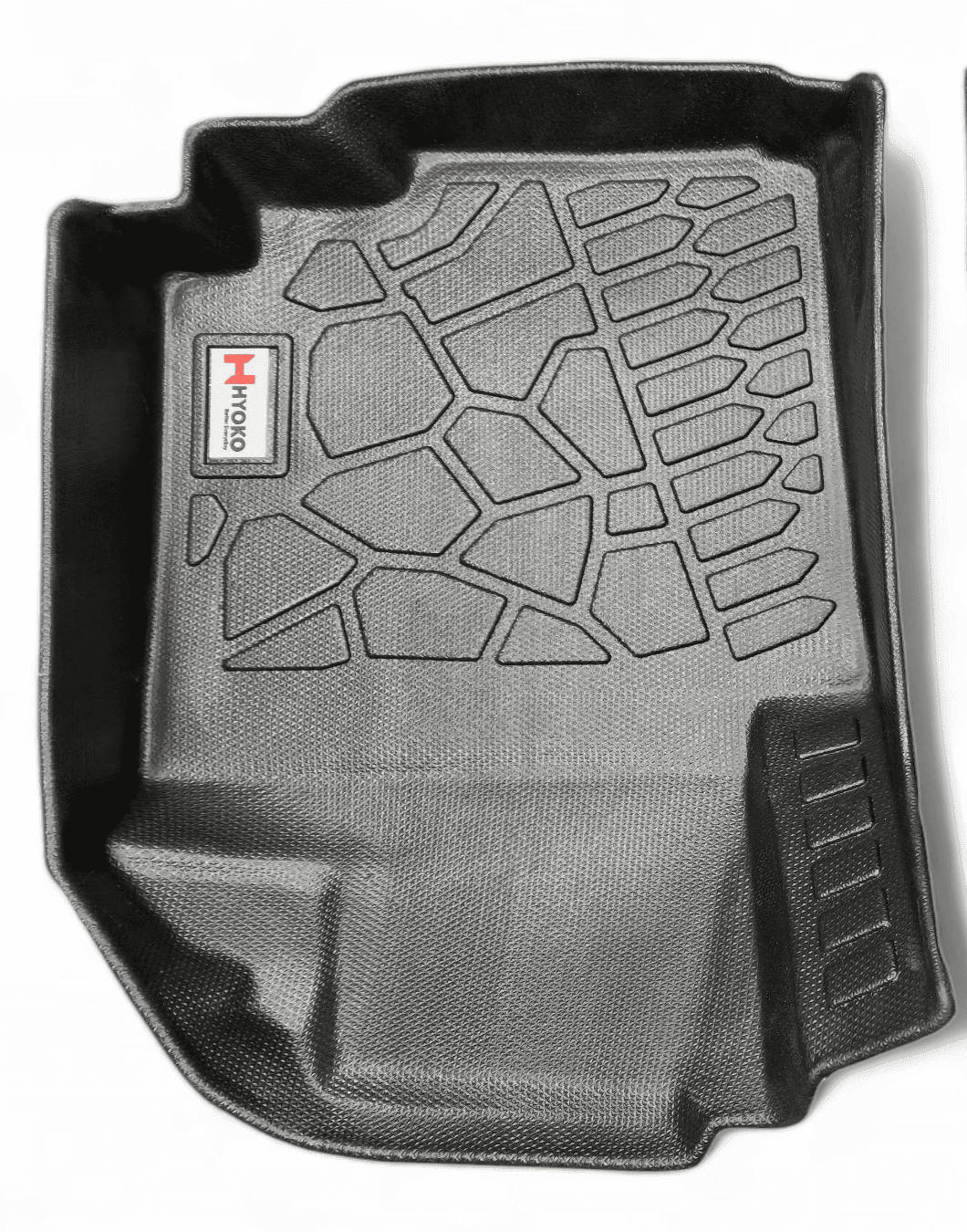 A black rubber floor mat with textured surface, designed to fit a vehicle's interior safely.