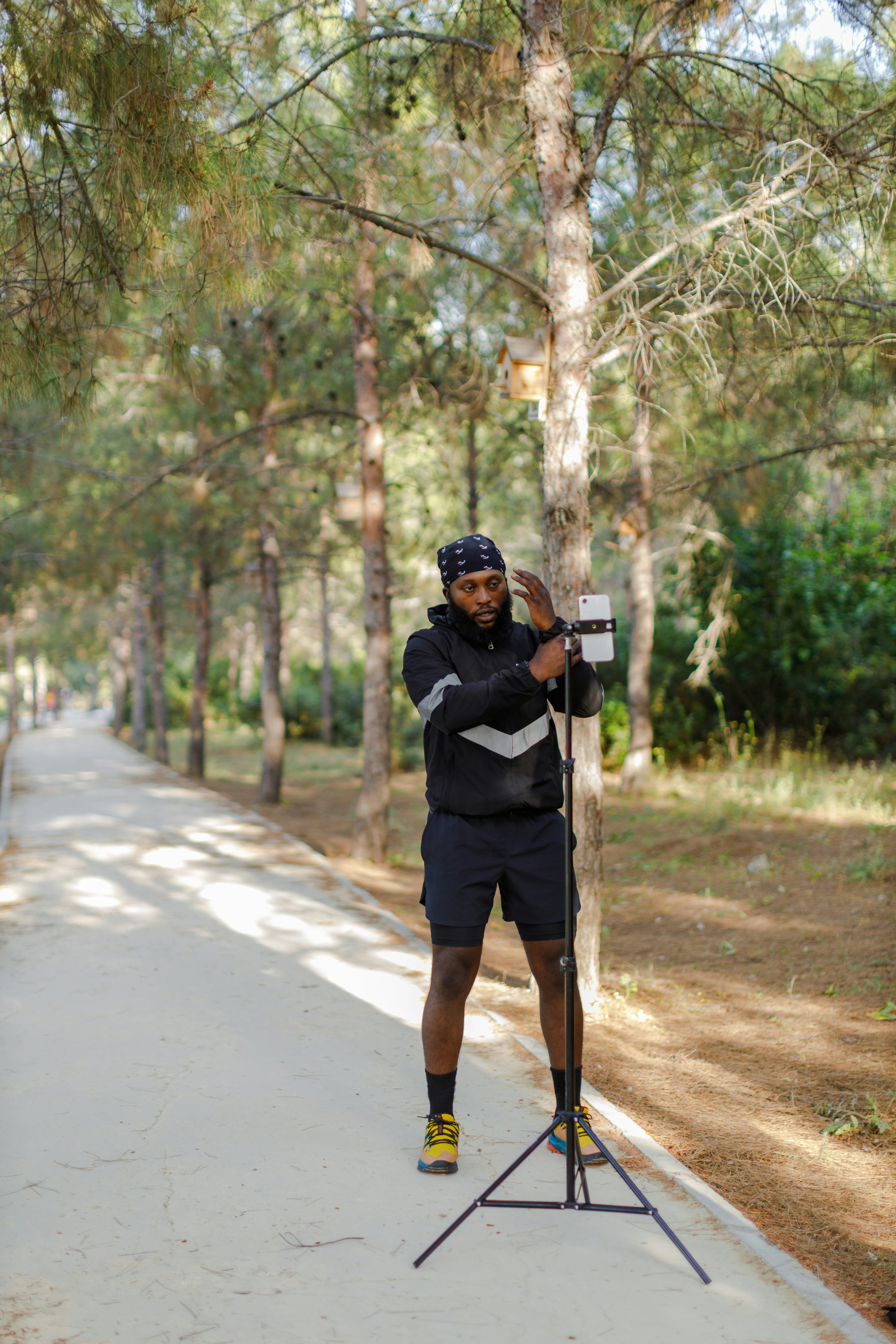 Man filming online course outside