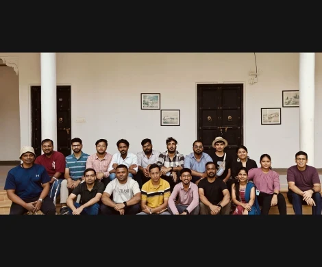 woman dropping a specimen on a test tube